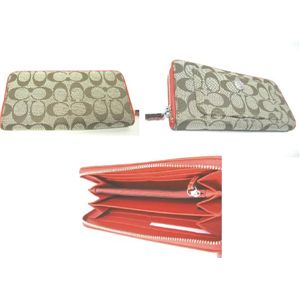 COACH�i�R�[�`�j �V�O�l�`���[ �A�R�[�f�B�I�� �W�b�v �A���E���h�����z �I�����W