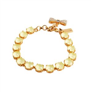 KATE SPADE（ケイトスペード） WBRUB814-797 Light Yellow リボンチャーム付 スワロフスキークリスタル ブレスレット Fancy That Bracelet